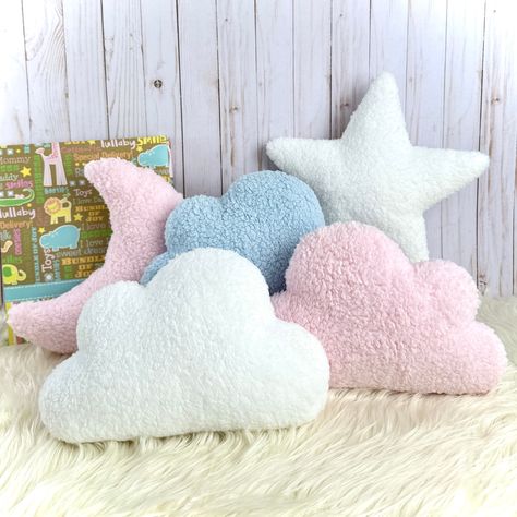 These adorable Cloud Pillows are perfect gift for kids and love ones.  They are super soft and cuddly! They come in 5 colorful colors white, pink, baby blue, bluish grey and light grey. Beautiful accent for nursery room, girls room, dorm decor, or sofa throw pillow.  Made of soft luxurious Sherpa fabric in both sides and filled with premium hypo-allergenic polyester fiber-fill that is made in the USA.  The cover is not removable. XS Cloud Pillow - 10" x 6" Small Cloud Pillow - 12" x 7.5" Medium Blue Dorm Room Ideas, Blue Dorm Room, Cloud Pillows, Cloud Decor, Blue Dorm, Cloud Decoration, Small Clouds, Cloud Cushion, Cloud Shape