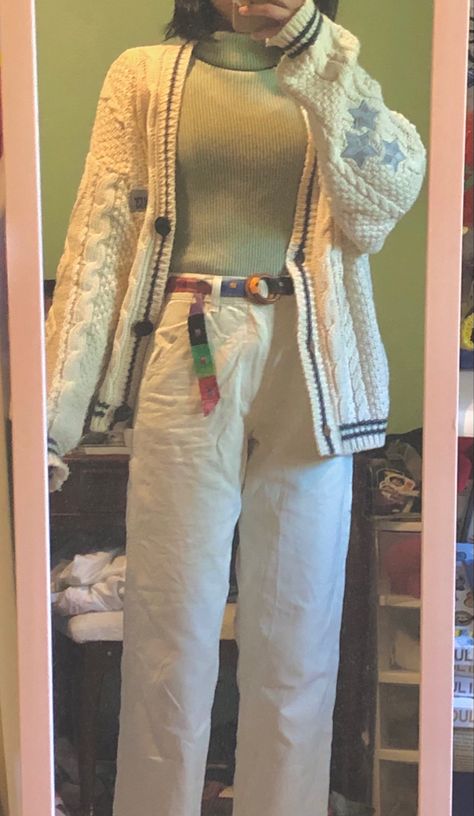 mirror selfie of outfit with sage green turtleneck, taylor swift cardigan, cream pants, thrifted belt Cream Colored Cardigan Outfit, Cardigan And Turtleneck Outfit, How To Style A White Cardigan, Preppy Cardigan Outfit, Taylor's Cardigan, Grandma Cardigan Outfit, White Cardigan Outfit Winter, Big Cardigan Outfit, Cardigan And Turtleneck