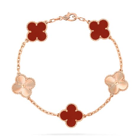 Faithful to the very first Alhambra® jewel created in 1968, the Vintage Alhambra creations by Van Cleef & Arpels are distinguished by their unique, timeless elegance. Inspired by the clover leaf, these icons of luck are adorned with a border of golden beads. Vintage Alhambra bracelet, 5 motifs, guilloché 18K rose gold, carnelian. Alhambra Van Cleef, Van Cleef Alhambra, Vintage Alhambra Bracelet, Alhambra Bracelet, Van Cleef And Arpels Jewelry, Van Cleef & Arpels, Carnelian Bracelet, Van Cleef And Arpels, Daughter Jewelry