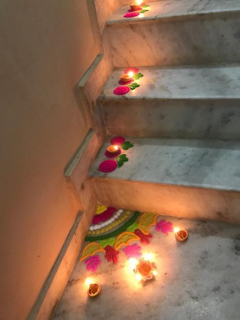 Diwali Rangoli For Stairs, Corner Decoration For Diwali, Rangoli Designs For Stairs Corner, Rangoli Design For Corner, Corner Flower Rangoli, Rangoli Designs For Stairs, Diwali Corner Decoration, Rangoli Corner Design, Rangoli For Corner