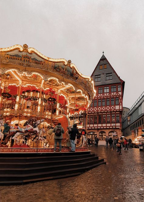 Christmas market in Europe in Frankfurt in Germany. Beautiful half-timed buildings and a beautiful carousel in the middle of Romer Strasse. Christmas market aesthetic Christmas in Europe beautiful Christmas markets in Europe beautiful Christmas markets in Germany Frankfurt Old Town, Frankfurt Christmas Market, Bobby Fisher, Frankfurt Christmas, Christmas Germany, Wanderlust Aesthetic, Christmas Building, Strasbourg Christmas, Christmas Markets Germany