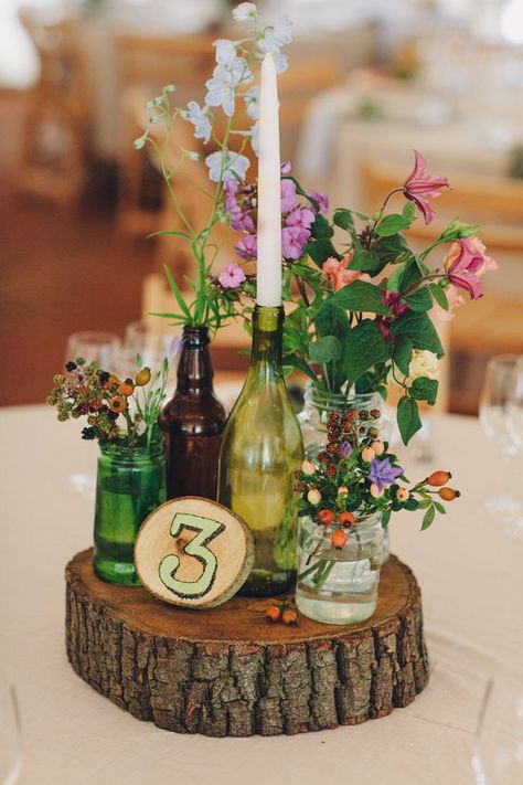 Love the flowers & berries!!!! Not crazy about the containers though. Wedding Vineyard Wedding Decor, Table With Flowers, Wedding Wine Bottles, Bottle Centerpieces, Wedding Bottles, בר מצווה, Wine Bottle Decor, Wedding Table Decorations, Table Centers