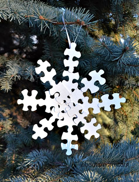 Snowflake Christmas ornament made from puzzle pieces. Christmas Snowflakes Crafts, Puzzle Piece Crafts, Diy Christmas Snowflakes, Christmas Snowflakes Decorations, Cheap Christmas Diy, Puzzle Crafts, Snowflake Decorations, Snowflake Christmas, Easy Christmas Diy