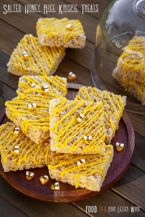 Salted Honey Rice Krispie Treats Recipe – FOOD is Four Letter Word Bumblebee Rice Krispie Treats, Honeycomb Rice Crispy Treats, Bee Party Treats, Honey Rice Krispie Treats, Bee Theme Rice Krispie Treats, Bee Rice Crispy Treats, Honey Bee Party Food, Honey Party Food, Bee Dessert Ideas