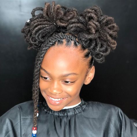 2 petal buns 😍😍😍 @queen.ladyybug Done at Karibbeankinks Natural hair salon ☎️ text (301)996-1285 📍location Style For Dreads, Hairstyles For Dreads, Kids Dreads, Locs Styles, Cute Dreads, Natural Hair Salons, Dreads Girl, Old Hairstyles, Dreadlock Styles