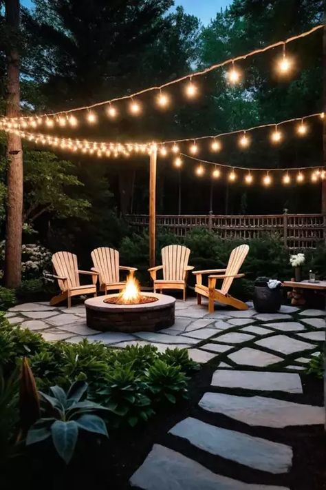 Backyard fire pit area with flagstone pathway and Adirondack chairs Yard Landscaping Fire Pit, Backyard Fire Pit And Pool, Best Fire Pit Ideas, Gazebo And Fire Pit Ideas, Backyard Deck Fire Pit, Natural Fire Pit Ideas Backyard, Outdoor Fire Pit Area Diy, Flagstone Patio With Fireplace, Front Yard Fire Pit Ideas