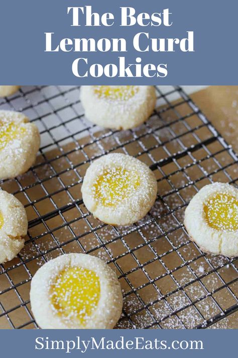 Lemon curd cookies with powdered sugar on baking rack. Lemon Curd Cookies Recipe, Best Lemon Curd, Lemon Curd Uses, Lemon Curd Dessert, Lemon Curd Cookies, Curd Cookies, Chocolate Covered Pecans, Thumbprint Cookie, Homemade Lemon Curd