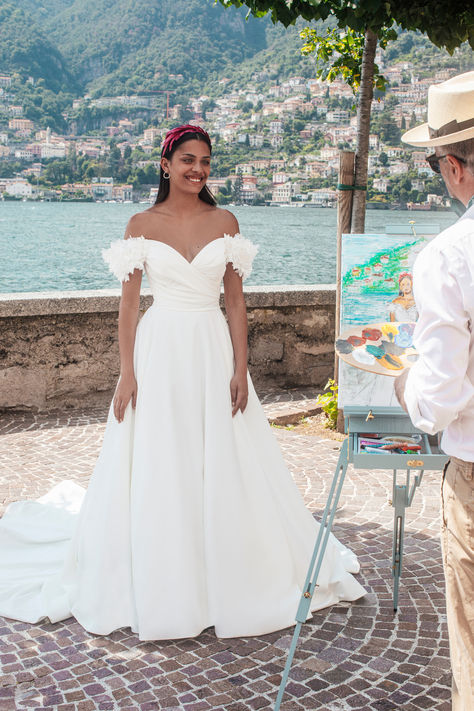 Classic and minimalist bridal silhouette off-shoulder dove satin with detachable floral sleeve #ballgown #weddinggown #classicbride #beachwedding Bridal Silhouette, Madison James Wedding Dress, Madison James Bridal, Bridal Aesthetic, Stella York Bridal, Jasmine Bridal, Madison James, Sophisticated Bride, Dress Guide