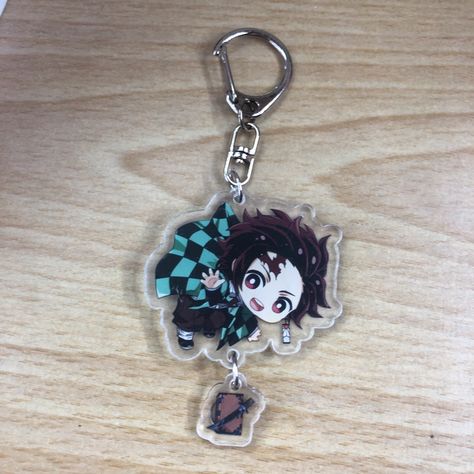 Demon Slayer Double-Sided Tanjiro Dangle Keychain. Brand New In Package! Features Tanjiro With A Dangling Charm Of His Wooden Casket And His Katana. Perfect For Any Demon Slayer Anime / Manga Fans Out There! Demon Slayer Merchandise, Demon Slayer Keychain, Dangle Keychain, Hot Topic Harry Potter, Anime Beanie, Notebook Labels, Demon Slayer Tanjiro, Bullet For My Valentine, Zombie Costume