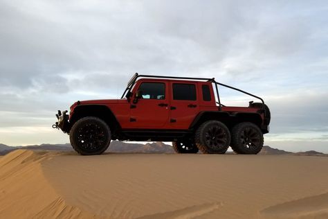 Nicknamed “Inferno,” this completely reworked 2016 Jeep Wrangler Rubicon 75th Anniversary Hard Rock Edition is powered by a Dodge Hellcat supercharged 6.2-liter V8 engine producing 707hp and 650 ft/lbs of torque backed by an automatic transmission. “Inferno” is a true 6x6 with three live axles. It was not built with a tag axle or a transaxle, but rather employs a completely custom driveline, specifically built for the vehicle. Custom Jeep Wrangler Unlimited, Dakota Truck, Hellcat Engine, Plymouth Prowler, 2016 Jeep Wrangler, Las Vegas Blvd, 2016 Jeep, Jeep Rubicon, Wrangler Rubicon