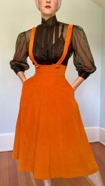 Amanda Suter on Instagram: "SOLD exclusively on IG! How sweet is this piece?! The color just KILLS my little Halloween-loving heart! Original late 1940s vibrant pumpkin orange super soft cotton corduroy pinafore dress by “Ilene Ricky!” Back metal zipper, reinforced waistband, hidden hip pockets lined in satin. Fitted gored midsection, nipped wasp waist, and gored flared skirt. Excellent condition, size small, accommodating any size bust, a higher waist/under-bust of 28 inches, a natural waist of Wasp Waist, Corduroy Pinafore, Costume Inspirations, Corduroy Pinafore Dress, Loving Heart, Heart Dress, Pinafore Dress, Pumpkin Orange, Flared Skirt