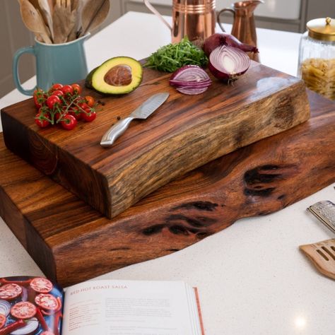 PRODUCT DETAILS. Made from Indian acacia wood, the live edge feature brings an eye-catching design to this piece and highlights its handmade beauty. . The Live Edge Collection Large Pyman Chopping board is made from Indian acacia wood creating charm and character, this range helps you to bring a feel of the outdoors in by creating a minimal and earthy look. The simplicity of these designs is what makes them so impressive, this chopping board is a chunky slab of wood at 8cm thick creating a natur Posh Houses, Large Chopping Board, Wood Chopping Board, Live Edge Furniture, Hill Interiors, Wooden Chopping Boards, Decor Luxury, Natural Edge, Handmade Beauty Products