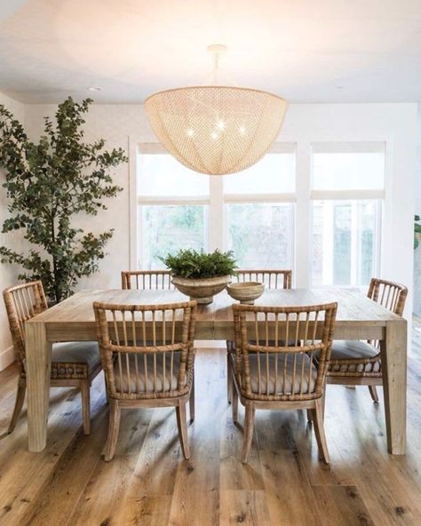 A fine mesh weave constructed from hand-beaded wood and coco beads blurs the lines between structured and refined, giving the Quinn Chandelier a soft, magic glow. Design: @puresaltinteriors // Photography: @vlentine Carolina Beach House, Salt Interiors, Beach Dining Room, Bamboo Dining Chairs, California Chic, Pure Salt Interiors, Whole House Remodel, Turtle Rock, Oak Meadow