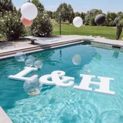 Pool Decor For Engagement Party, Pool Decorations For Engagement Party, Floating Initials In Pool, Engagement Pool Party Decorations, Pool Floaters For Wedding, Backyard Pool Engagement Party, Large Letters For Party, Wedding Party Decorations Outdoor, Pool Side Engagement Decor