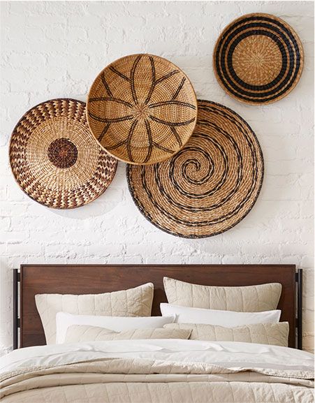 Woven Mat Wall Decor, Boho Basket Wall Art Bedroom, Baskets Above Bed, Basket Wall Decor Modern, Woven Plates On Wall, Woven Bowls On Wall, Boho Chic Basket Wall, Boho Basket Wall Art Woven, Wall Decor Mirrors