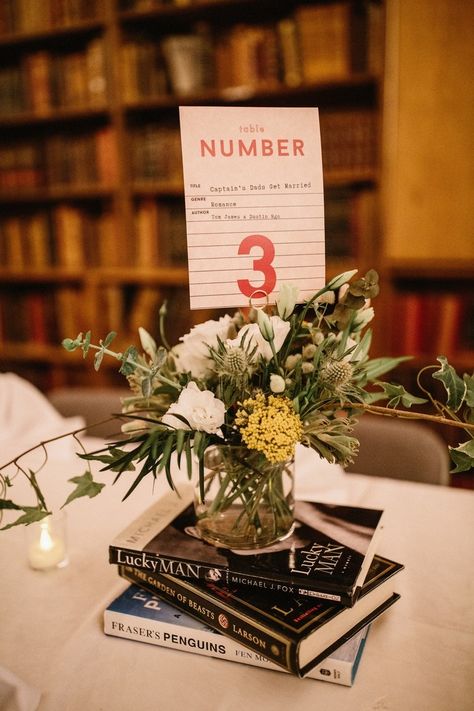 Book Themed Wedding Table Numbers, Plant Lovers Wedding, Vintage Book Centerpiece, Book Lovers Wedding, Cheap Wedding Table Centerpieces, Storybook Theme, Book Centerpieces, Book Themed Wedding, Literary Wedding