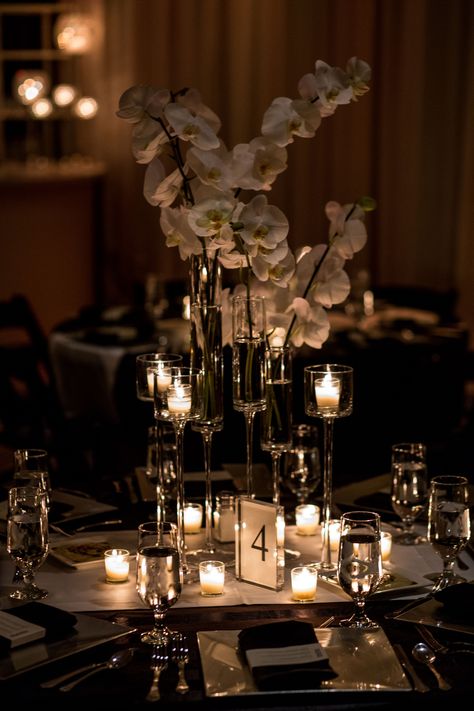 Single Stem Orchid Centerpiece, Orchid Wedding Table Centerpieces, Orchid Floral Arrangements Wedding Ideas, Orchid Plant Centerpiece Wedding, Orchids Centerpiece Wedding, Black Tie Wedding Centerpieces, Candle And Flower Centerpieces Wedding, Wedding Centerpieces Black, Classy Centerpieces