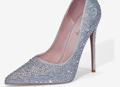 The sparkling high heels with gorgeous rhinestone decorations are perfect for weddings, parties, and other occasions. The slender heels wrap around the colorful rhinestones, which change with the light and create an eye-catching effect. They are an excellent choice to make you the focus under the spotlight. #heels #sparklyheels Wedding Heels For Bride, Heels For Bride, Comfortable High Heels Shoes, Prom Shoes Sparkly, Heels Sparkly, Rhinestone Pumps, Rhinestone High Heels, Sparkly Heels, Womens Stilettos