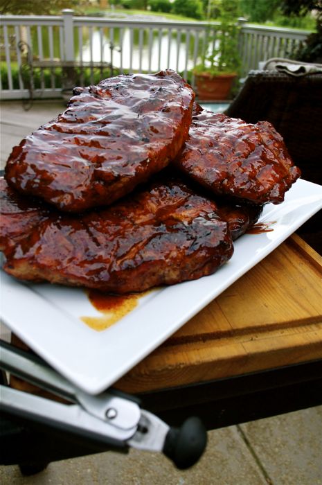 An explanation of what exactly a pork steak is as well as how to perfectly prepare them on the grill, slathering them with a gooey BBQ sauce. | A Midwestern BBQ Staple – Pork Steaks | http://grillinfools.com Bbq Pork Steaks, Grilled Pork Steaks, Bbq Meals, Pork Steak Recipe, Pork Steaks, Grilled Steak Recipes, Smoked Meats, Barbecue Ribs, Pork Steak