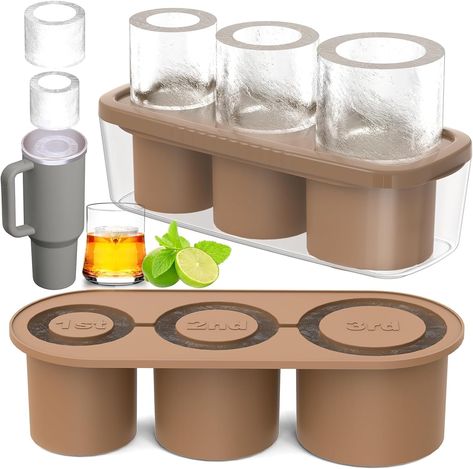 PRICES MAY VARY. Specialized Design: This ice cube tray with lid creates 3 large hollow cylindrical ice cubes that are perfectly compatible with 40OZ glasses, ensuring that your drinks stay cool for a long time. The slow melt feature of these extra large ice cubes ensures that your drink is not diluted and retains its original flavor and quality, so let's cool any drink this summer with these large ice molds! Food Grade Silicone Material: This cup ice mold is made of durable and safe silicone ma Ice Cube Tray Molds, Silicone Ice Cube Tray, Ice Cube Maker, Ice Cube Molds, Ice Molds, Ice Cube Trays, Summer Gifts, Iced Drinks, Ice Maker