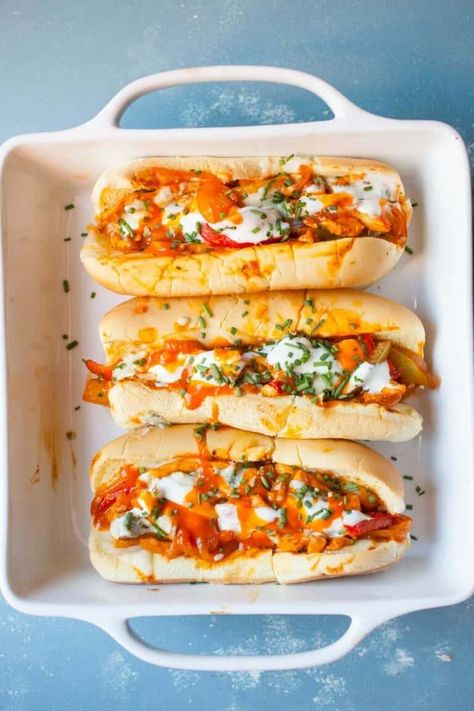 Baked Buffalo Chicken Subs: These have some of my favorite flavors and are easy to toss together either for dinner or for a hearty game day appetizer. Spicy and cheesy! | Macheesmo.com Baked Buffalo Chicken Sandwich, Buffalo Chicken Sub, Subs Sandwiches, Chicken Subs, Buffalo Recipe, Baked Buffalo Chicken, Buffalo Chicken Sandwiches, Street Cafe, Sub Sandwiches