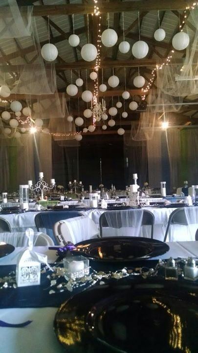 Machine shed wedding . Lanterns , lights , tulle . Machine Shed Wedding Reception, Machine Shed Wedding, Garage Wedding, Wedding Photo Table, Farm Reception, Reception Lighting, Shed Wedding, Quincenera Dresses, 50th Anniversary Cakes