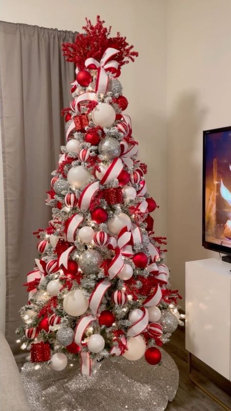 Classic Christmas. You can never go wrong with a red, white, and silver color scheme. ❤️🤍🩶 . . . . . . #classicchristmas #christmastreedesigner #christmastree #christmastreeinspo #absholidaydecor #hobbylobby #athome #christmascountdown #christmasiscoming #fypシ #explorepage #reelsinstagram #cozychristmas #noel #navidad #christmasdecor #christmasaddict #christmasmood #tistheseason #winterholiday #holidayseason | AB's Holiday Decor | Auni · Twinkling Lights (Reimagined) Red White Silver Christmas Tree Ideas, Red Snd White Christmas Tree, Red White And Silver Christmas Tree Decorating Ideas, Red And White Ribbon Christmas Tree, White Red And Silver Christmas Tree, Red And White Ornaments Christmas Tree, Silver White And Red Christmas Tree Decorating Ideas, Christmas Tree Silver And Red, Red Silver And White Christmas Tree