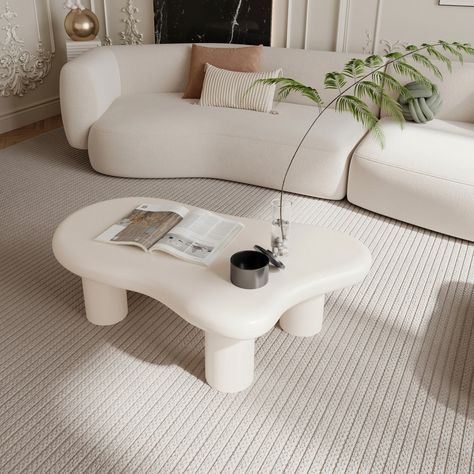 This whimsical coffee table features a unique cloud shape that adds a touch of playfulness and sophistication to your living room, bedroom, study, or balcony. Its versatile design makes it a perfect fit for various interior styles, from modern to eclectic. Crafted with precision, the table's smooth surface is ideal for displaying books, decor, or enjoying a cup of coffee. The durable construction ensures it withstands daily use, while the elegant finish adds a touch of luxury to your home. The 4 Cloud Table Decor, Cloud Living Room, Unique Coffee Table Ideas, Target Side Table, Whimsical Coffee Table, Cute Coffee Table, Cloud Table, Cloud Coffee, Cream Table