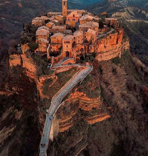 Civita di Bagnoregio is a hilltop village in central Italy Umbria Italy, Travel Destinations Bucket Lists, Italy Photography, Beautiful Castles, Umbria, Places Around The World, Land Scape, Italy Travel, Travel Dreams