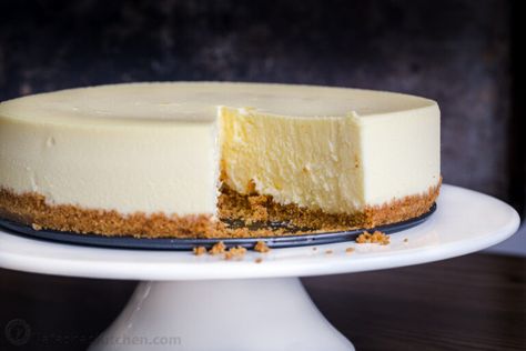 This classic Cheesecake is a tall, ultra-creamy, New York-style cheesecake. Baking with the water bath method is the secret to ensuring the perfect rise with a level top and no cracks. Homemade Cherry Sauce, Perfect Cheesecake Recipe, Natashas Kitchen, Perfect Cheesecake, Cheesecake Trifle, Cheesecake Recipes Classic, Homemade Cheesecake, Classic Cheesecake, How To Make Cheesecake