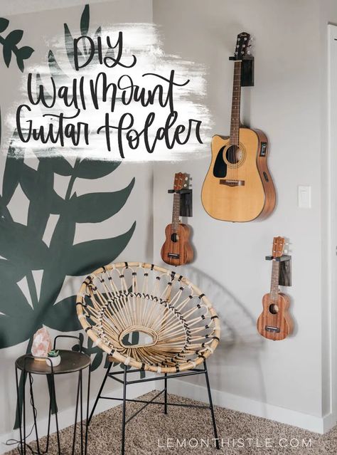 As an artist, I love finding creative ways to display my instruments. It not only keeps them safe and organized, but also adds a personal touch to my ... Guitar Hanging Ideas, Boho Corner, Hanging Guitars, Guitar Holder, Artsy Crafts, Guitar Wall, Inspired Interiors, Boho Farmhouse, Modern Diy