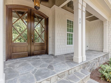 Flagstone porch and beautiful doors by Horizon Custom Builders stained in Minwax Jacobean Flagstone Porch, Front Porch Stone, Stone Porches, Front Walkway, Building A Porch, Stone Steps, Flagstone Patio, Porch Flooring, Front Patio