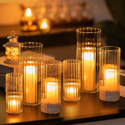 PRICES MAY VARY. Dimensions: 2.6'' x 5.9'' | 3.15'' x 7.9'' | 3.9'' x 9.8'' | Set of 6 Assorted Glass Cylinder Vase. Work well with floating candles, pillar candles and flowers. Modern Candle Vase: This glass hurricane cylinder can be used as ribbed glass vase as well as glass hurricane candle holder. Fluted glass cylinders design add a unique touch to your home. It a neutral glass pillar candle holder that shows off plants without being over stating, and is the most effective decoration for alm Glass Tall Pillar Candle Stick Holders With Floating Candles, Homemade Pillar Candle Holder, Black Bottle Candle Holder, Large Floor Candle Holders Glass, Candle Cup Holder, Candle Sticks On Mantle Modern, Candles For Kitchen Table, Glass Vase Lantern, Mercury Glass Candle Sticks