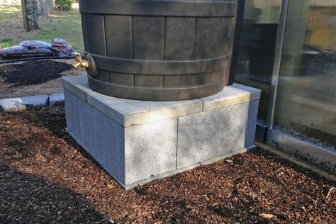 The Southern Gardener Rain Barrel Platform courtesy of http://southern-gardener.com/2017/07/diy-rain-barrel-stand/ Cinder Block Rain Barrel Stand, Diy Rain Barrel, Washer And Dryer Stand, Rain Barrel Stand, Rain Barrel System, Landscaping Patio, Barrels Diy, Cinder Block Bench, Block Bench