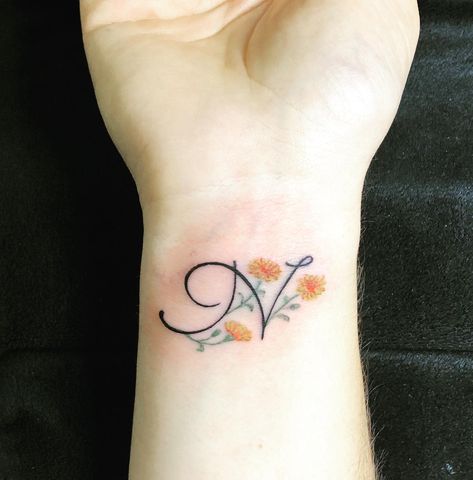 Marigold Wrist Tattoo, Marigold Tattoo Design, Marigold Flower Tattoo, Sarah Tattoo, Red Flower Tattoos, Marigold Tattoo, Mama Fashion, Shamrock Tattoos, Virgo Tattoo