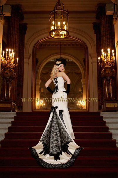 black and white wedding dress. I love the bustle and lace up corset top (wonder what the front looks like...) Halloween Wedding Dresses, White Bridal Gown, Lovely Wedding Dress, Gothic Wedding Dress, Goth Wedding, Steampunk Wedding, Wedding Dresses Corset, White Wedding Dress, Gothic Wedding