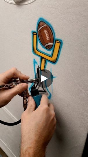 7.1M views · 83K reactions | Simple chest pocket football 🏈 design done with airbrush #graffiti #art #airbrush | Dale the Airbrush Guy | Dale the Airbrush Guy · Original audio Airbrush Art Ideas, Airbrush Graffiti, Graffiti Car, Airbrush Designs, Air Brush, Airbrush Art, Football Design, Graffiti Art, Chest Pocket