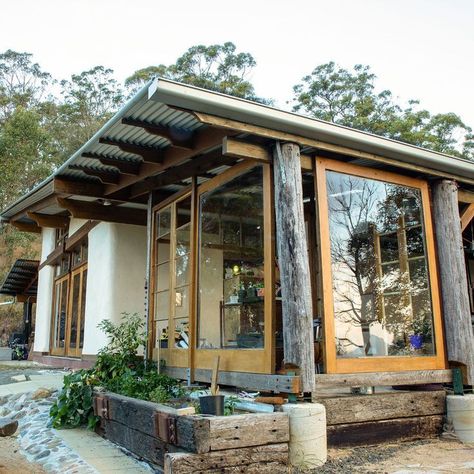 This small stone house in the woods is more than just a shelter; it is a sanctuary, a place where one can find solace in the embrace of nature, where the worries of the world melt away amidst the tranquility of the wilderness.

#NatureRetreat #RusticLiving #StoneHouse #ForestHome #OffGridLiving #WildernessEscape #SustainableArchitecture #SereneSanctuary #CozyCabin #WoodsyCharm Earth Home Design, Cob House Exterior, Stone House In The Woods, Creative Lighting Ideas, Small Stone Cottage, Sustainable Architecture House, Cottage Building, Strawbale House, Small Stone House