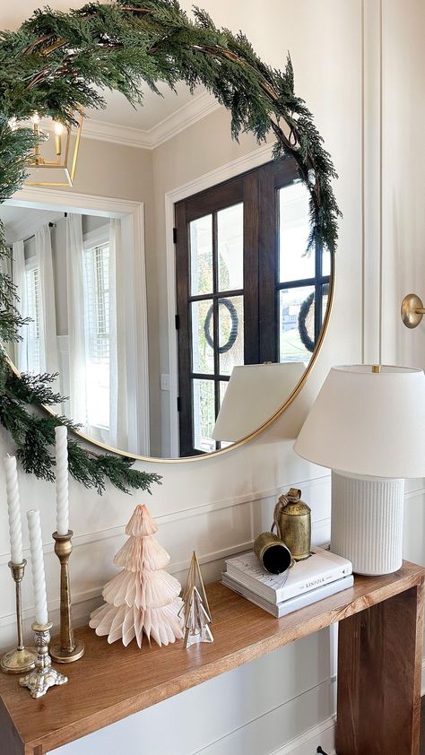 UPDATE: this exact garland is sold out now but I’ve linked similar options on LTK 🎄 Wondering how to get that trendy draped garland… | Instagram Christmas Mirror, Christmas Entry, Christmas Entryway, Table Garland, Silver Christmas Decorations, Christmas Apartment, Gold Ceiling, Command Hooks, Christmas Interiors