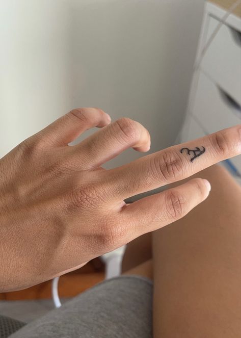 Finger Tattoo on Ring Finger Single Finger Tattoo, Letter A Finger Tattoo, Old English Finger Tattoo, R Finger Tattoo, Finger Name Tattoos For Women, Finger Letter Tattoo, Finger Tattoo Letter, Letter Finger Tattoo, Side Of Finger Tattoo