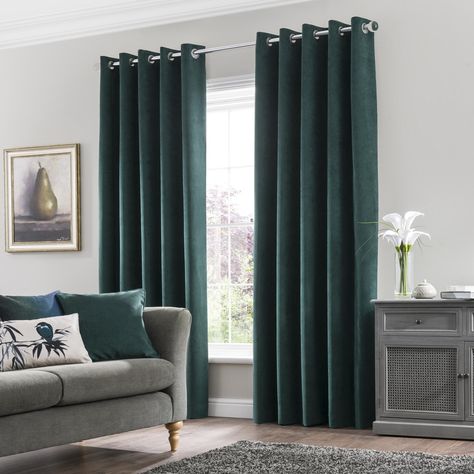 Designed in a stylish and eye-catching jade green, these modern eyelet curtains are perfect to enhance a variety of contemporary and traditional décors. These curtains are crafted from a super soft matt velour fabric for a sophisticated finish and are fully lined to improve privacy by blocking the view into your home. Available in a variety of widths and drops to suit your requirements.Please note: these curtains are sold as a pair. Green Curtains Living Room, Curtains Dunelm, Eyelet Curtains, Green Curtains, Lined Curtains, Living Room Green, Velvet Curtains, Bedroom Green, Decoration Inspiration