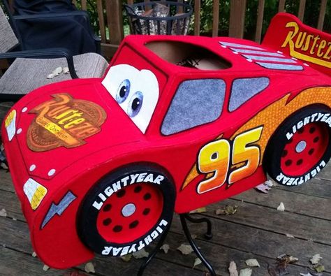 I wanted to make a costume for my 2 year old son this year, but needed to decide between his two favorite LOVES: Lightning McQueen and Thomas the Train. I decided to go with Lightning since it I thought it would be more fun for me to make.I had an idea on how I was going to build it, but before I started I jumped on Pinterest to see how others went about it. I saw some absolutely fantastic costumes. The majority of the ones I saw used cardboard (yay!), but were spray painted and used printed ... Diy Lightening Mcqueen Costume, Lightning Mcqueen Costume Diy, Cars Costume, Disney Party Diy, Piñata Cars, Mcqueen Costume, Lightning Mcqueen Costume, Decoracion Halloween, Car Costume