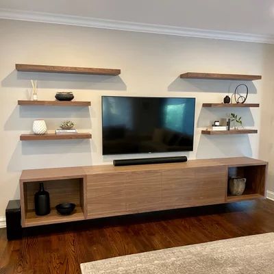 Floating Living Room Cabinets, Living Room Entertainment Wall Modern, Floating Tv Stand With Shelves, Floating Shelves On Either Side Of Tv, Floating Entertainment Center Decor, Boho Modern Entertainment Center, Floating Tv Entertainment Center, Low Entertainment Center Decor, Entrainment Center Ideas