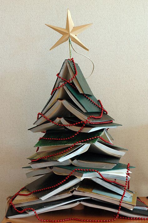 Another pretty Book Tree. Which would be your branches? Unusual Christmas Decorations, Unusual Christmas Trees, Book Christmas Tree, Book Tree, Alternative Christmas, Creative Christmas Trees, Alternative Christmas Tree, Unique Christmas Trees, Christmas Tree Design