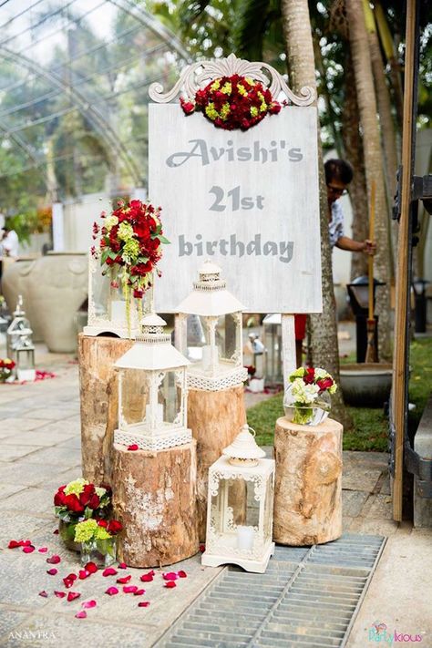 Welcome sign with rustic logs, flower petals, and lanterns from a Rustic Vintage 21st birthday Party at Kara's Party Ideas. See the pics at karaspartyideas.com! Rustic Birthday Party Decorations, 22 Birthday Decorations, Rustic Birthday Parties, 21st Birthday Sign, Vintage Party Decorations, Vintage Birthday Parties, 21st Bday Ideas, Rustic Birthday, 21st Birthday Party