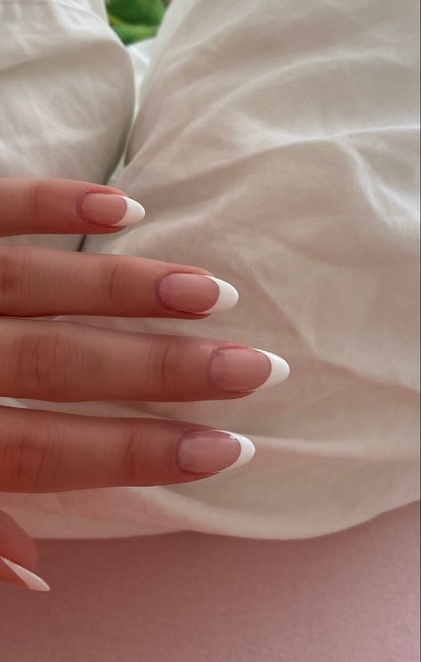 Modern White French Tips Incorporating Minimalist Graphic Elements Small Almond French Tip Nails, Pointed French Tip Nails, Grad Nails, French Tip Gel Nails, Teen Nails, White Tip Nails, May Nails, Graduation Nails, Formal Nails