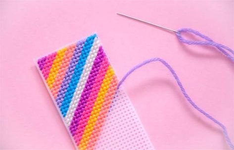 frankie exclusive diy: rainbow tapestry bookmark Rainbow Tapestry, Frankie Magazine, Tent Stitch, Handmade Tapestries, Diy Rainbow, Needlepoint Tapestry, Needle Thread, Plastic Sheets, Hot Glue Gun