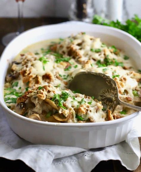 My easy Creamy Oven-Baked Asiago Chicken Breast recipe features moist, tender oven-baked chicken breasts topped with earthy mushrooms and bell pepper, a creamy, dreamy bechamel sauce, crunchy herb stuffing mix, and rich, nutty, melted asiago cheese. Add a salad and this one-dish, casserole dinner is a winner. #gritsandpinecones, #casserole, #chicken, #chickenrecipes, #comfortfood, #dinnerrecipes, #dinner, #sundaysupper Oven Baked Creamy Chicken, Asiago Chicken, Casserole Chicken, Oven Baked Chicken Breasts, Herb Stuffing, Chicken Breast Recipe, Asiago Cheese, Stuffing Mix, Bechamel Sauce