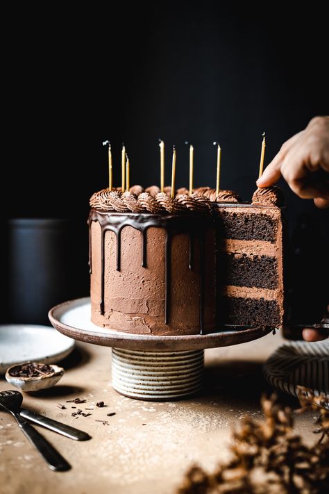 This rich tripe chocolate drip cake has three layers of dense and fudgy chocolate cake. It's filled and covered with a smooth dark chocolate buttercream, and topped with a dramatic ganache chocolate drip. It's crowned with a decorative buttercream rope border for a simple and elegant design worthy of any special occasion. Chocolate Ganache Drip Cake, Dark Chocolate Buttercream, Marzipan Cake, Chocolate Ganache Cake, Chocolate Cake Designs, Ganache Cake, Chocolate Drip Cake, Rope Border, Chocolate Cake Decoration