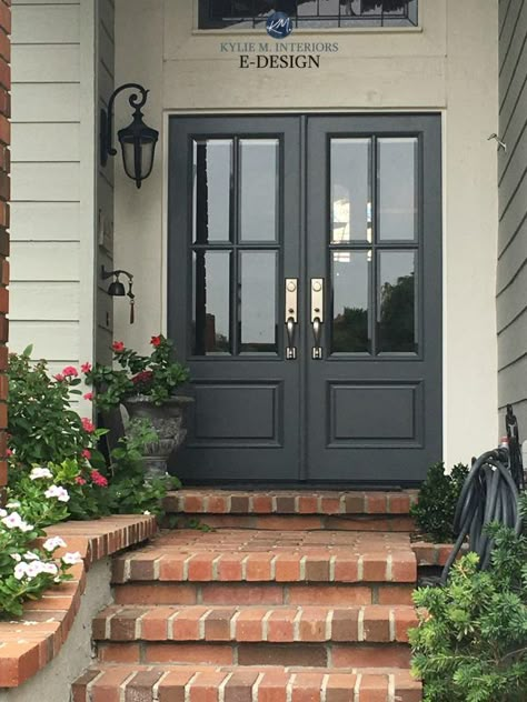 Front door Benjamin Moore Charcoal Slate, red brick stairs on exterior. Kylie M INteriors Edesign, online paint color consulting Best Front Door Colors, Exterior Door Colors, Tan House, Best Front Doors, Front Door Paint Colors, Door Paint Colors, Red Brick House, Brick Exterior House, Painted Front Doors